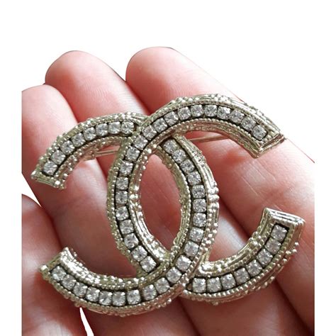 chanel costume brooch|cost of Chanel brooch.